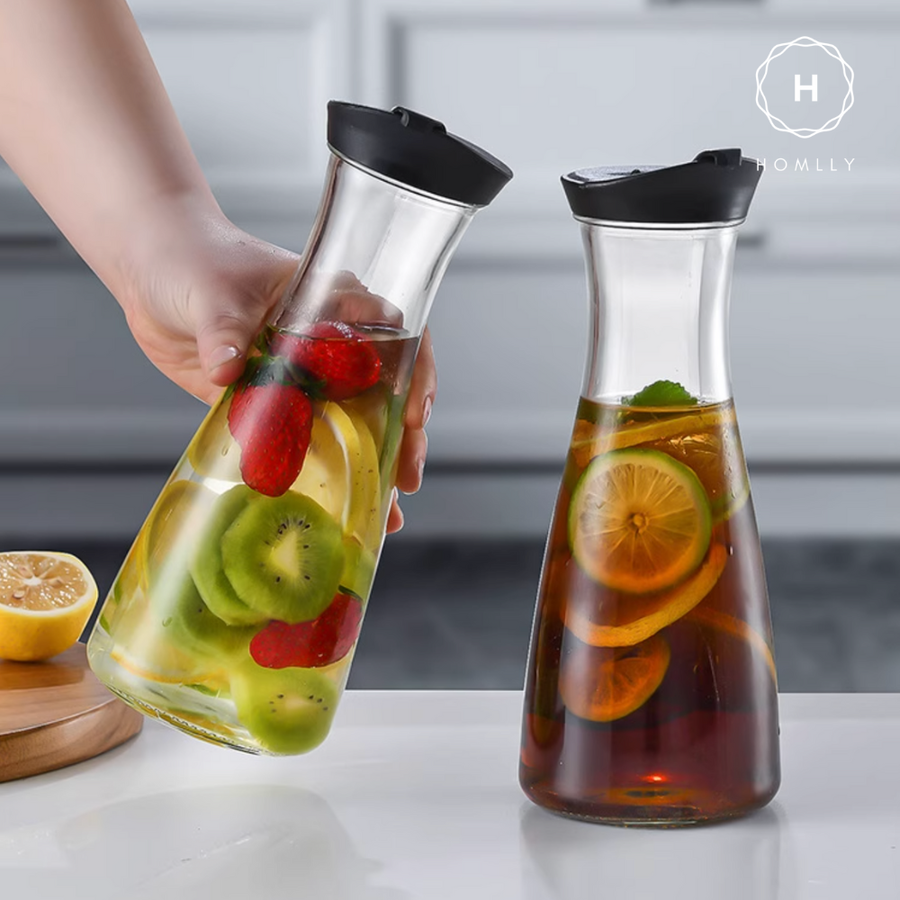 Homlly 1L Glass Water Carafe Clear Pitcher with Flip Top Lid (Round Base)